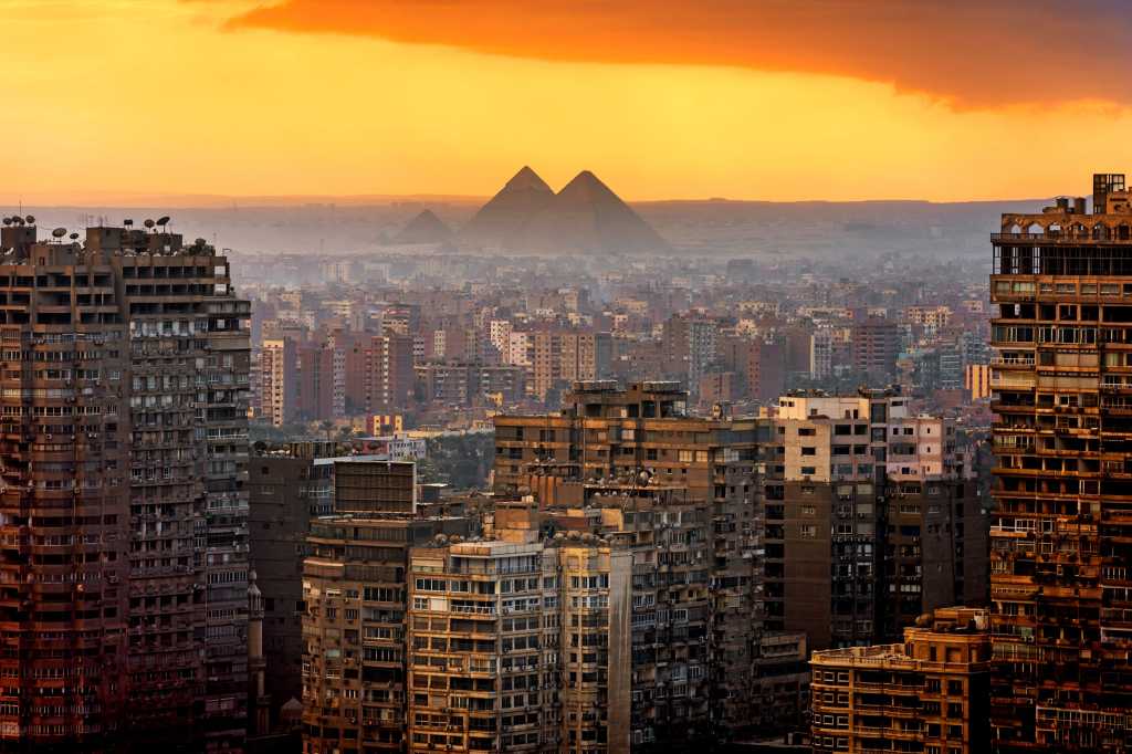 CIO | Middle East  >  Egypt  >  Cairo skyline + Giza pyramids