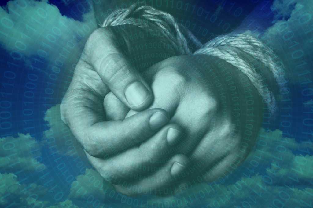 hands tied restricted locked in handcuff trapped in contract by nattasaadzic getty