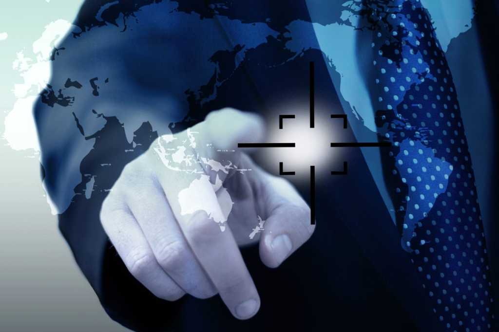 man pointing at virtual map target strategy plan global