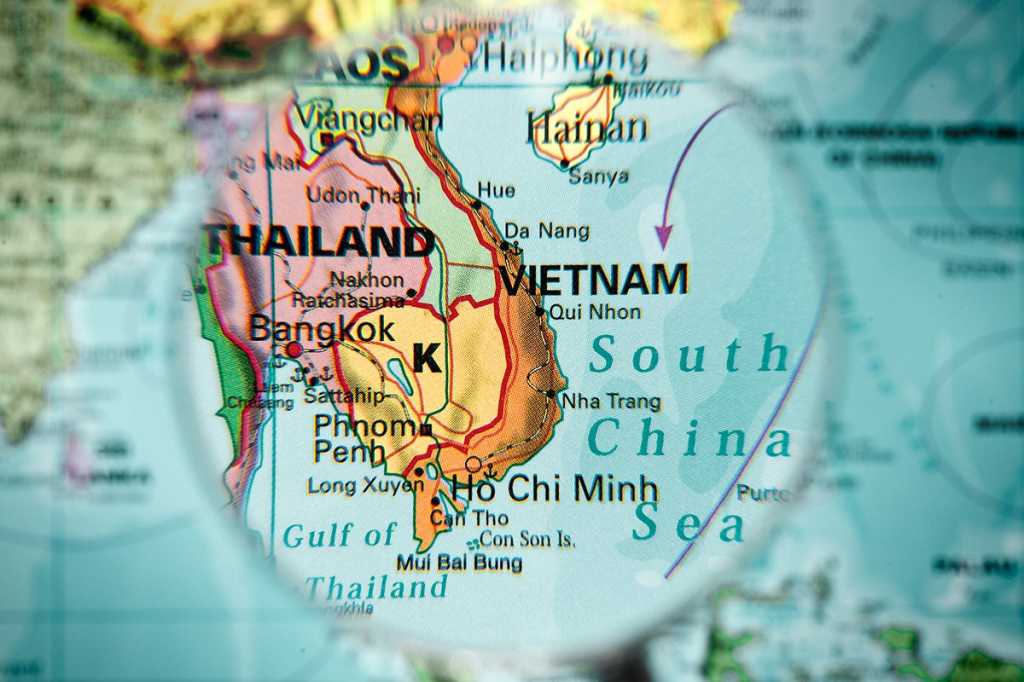 Map, magnifying lens  >  Vietnam