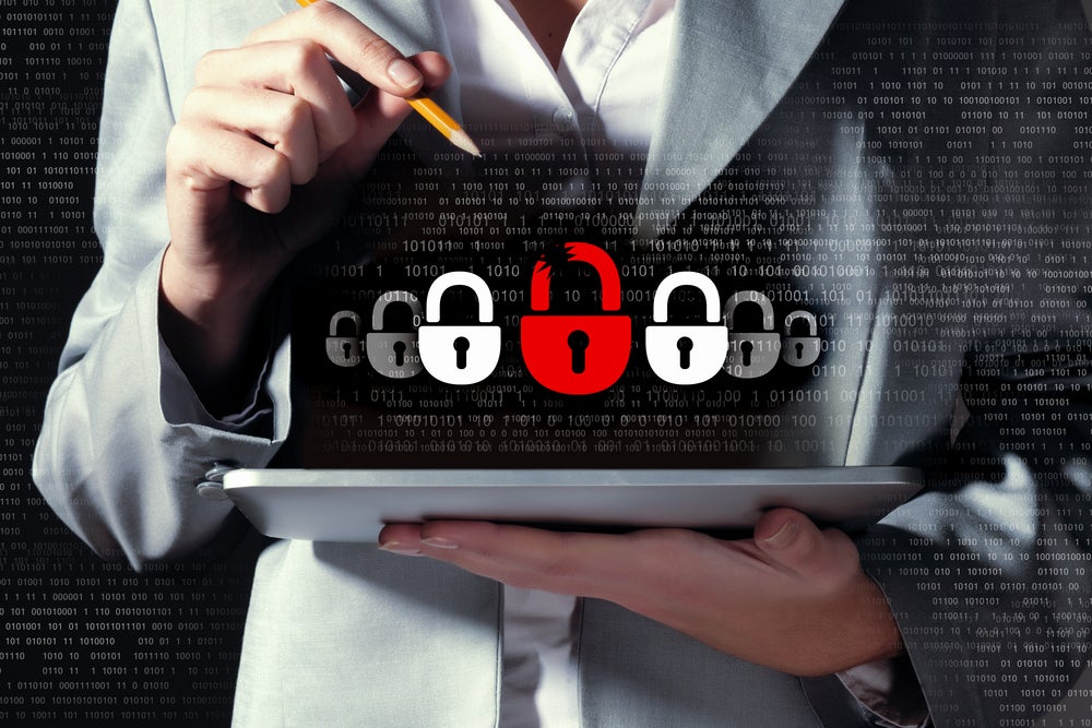 woman on tablet with broken lock