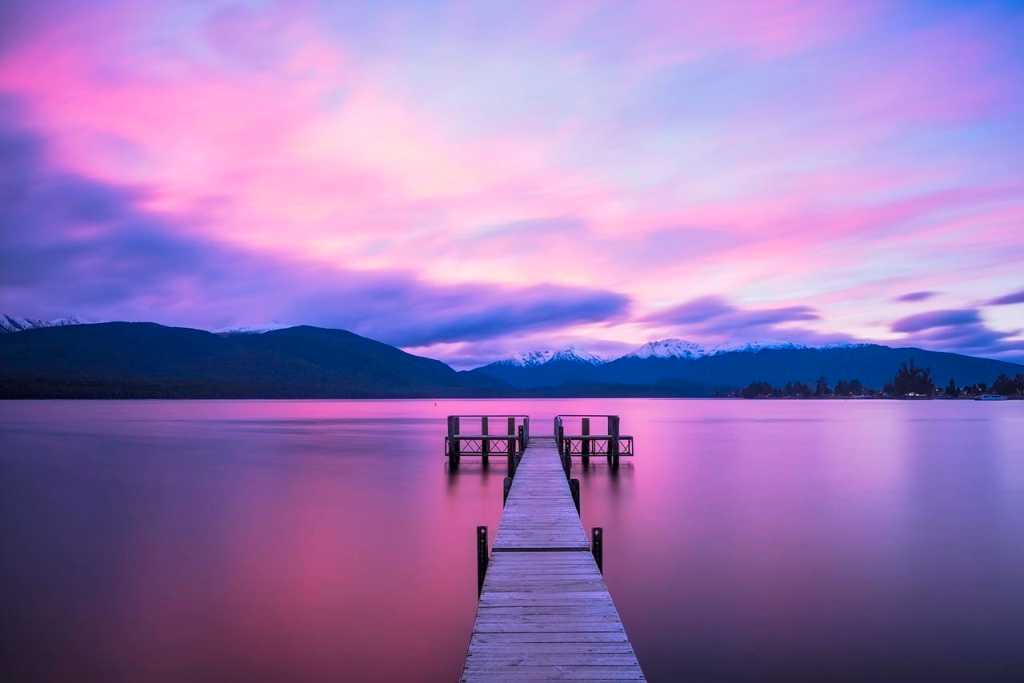 dock on lake at sunset