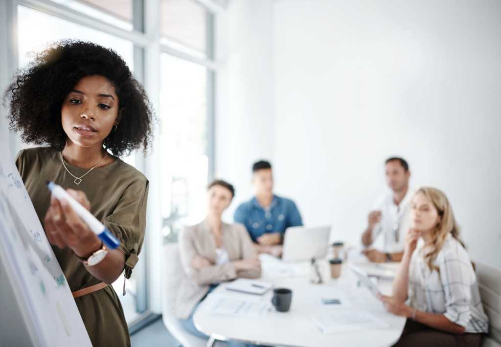 woman presenting at meeting