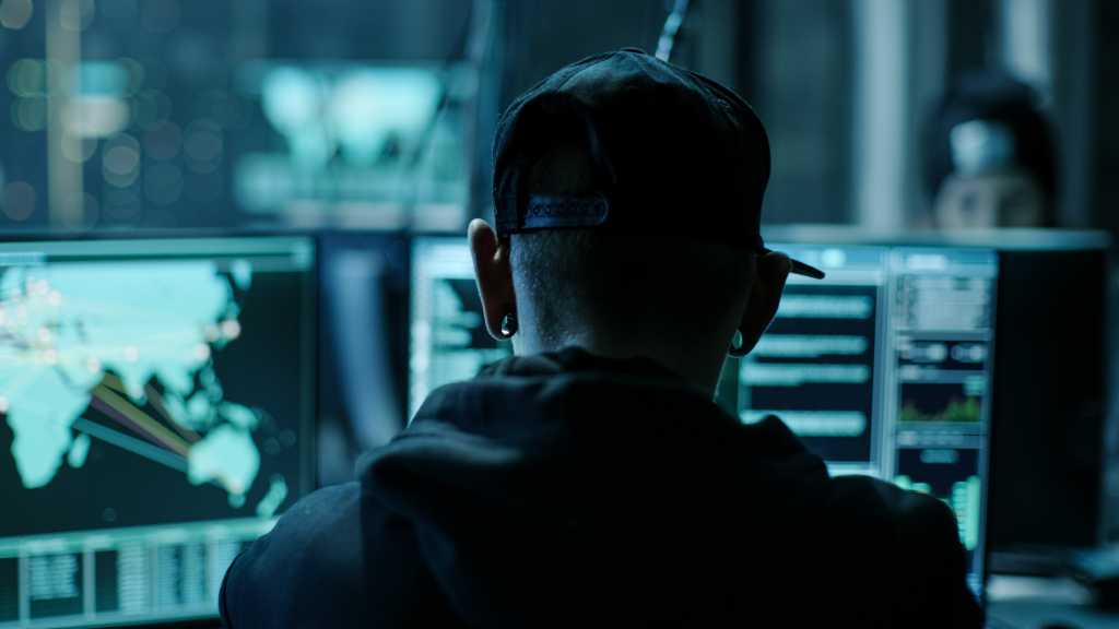 hacker facilitating DDoS attack